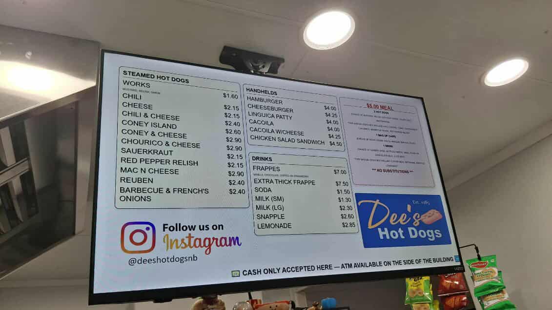Dee’s Hotdogs – dual digital menu boards over the counter.